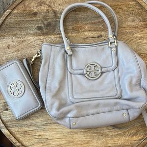Grey Tory Burch crossbody/shoulder bag and matching wallet.